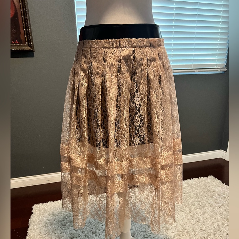 Pink Elegant Lace Skirt With Faux Leather Underneath. NWT.